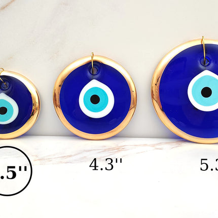 Erbulus 3.5" Glass Blue Evil Eye Wall Hanging Gold Ornament - Turkish Nazar Bead - Home Protection Charm - Gold Wall Decor Amulet in a Box (Medium)